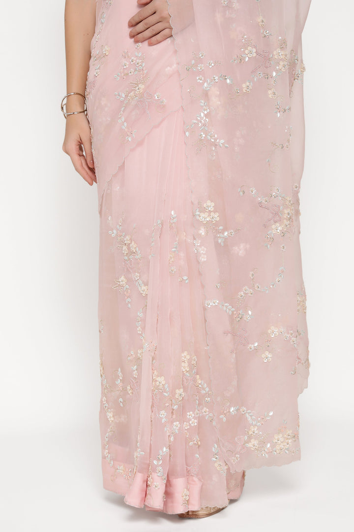 Pink floral dress on a white background