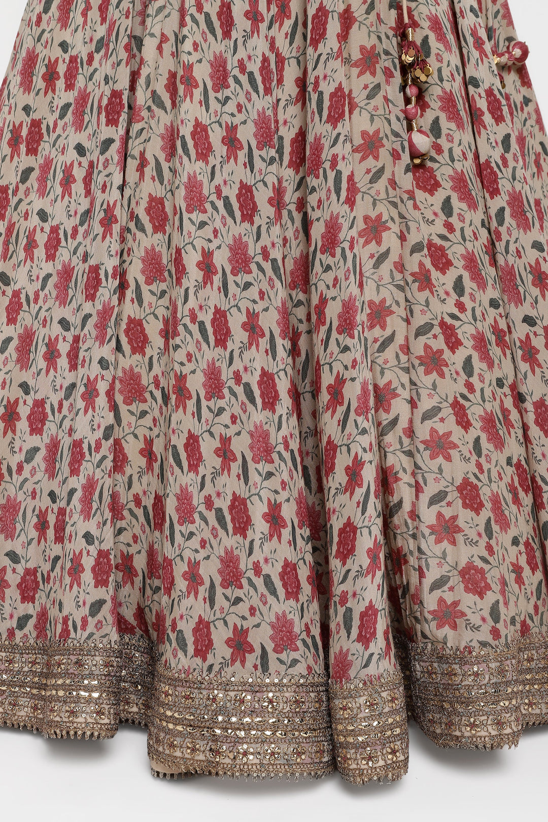 Traditional outfit with red floral pattern on a beige background