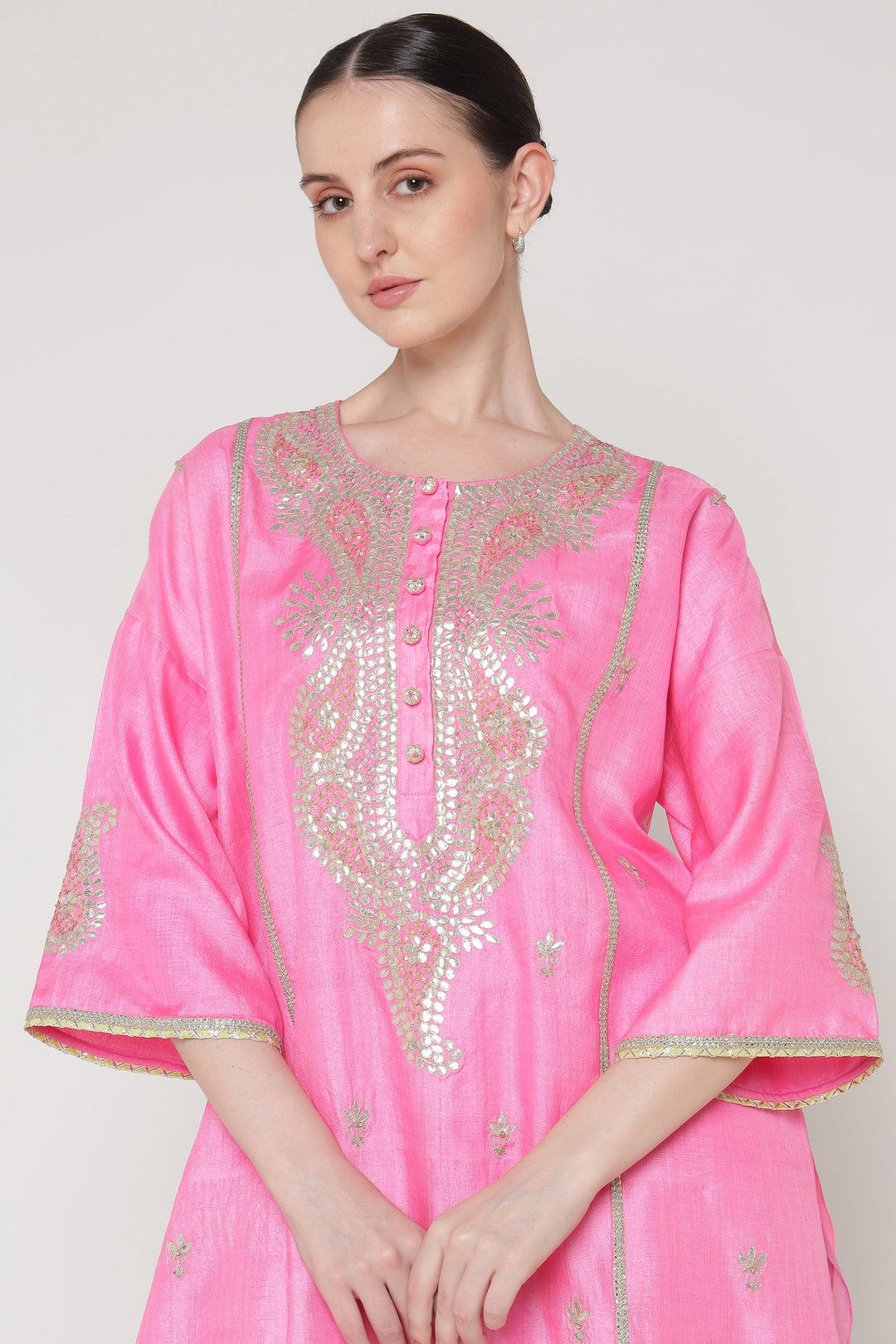Pink kurta with silver embroidery on a plain background