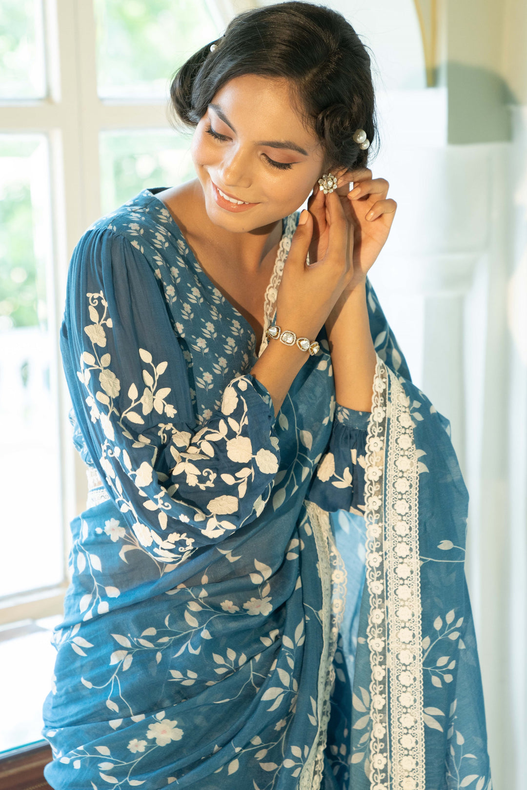 Ambar Dori Blue Printed Saree